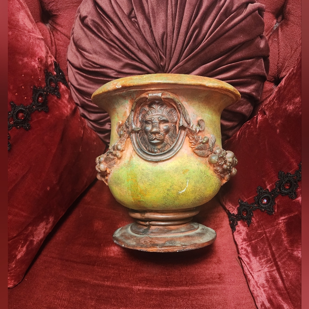 Vintage lion urn planter.